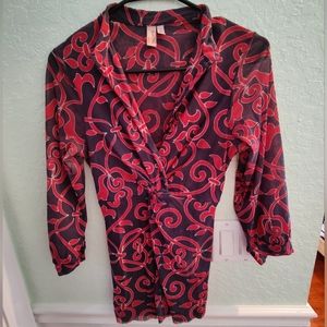 Sheer black blouse with red detailing